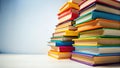 A Vibrant Stack of Books A CloseUp Exploration of Color and Texture Against a Pristine White Background Captured Royalty Free Stock Photo