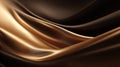 Luxurious waves of flowing chocolate and gold fabric create an elegant backdrop. Royalty Free Stock Photo