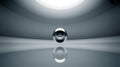 Silver Sphere Reflecting on a Smooth Surface in a Modern Setting Royalty Free Stock Photo