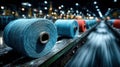 Spools of Thread in a Textile Factory with Bokeh Background Lights Royalty Free Stock Photo