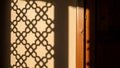 Geometric Shadow Pattern on Wall with Sunlight and Wooden Frame Royalty Free Stock Photo