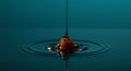 captivating liquid cascade embracing a textured sphere on deep teal backdrop - generated using ai