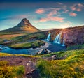 Captivating morning view of popular tourast destination - Kirkjufellsfoss Waterfall.