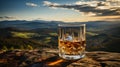 malt whisky in a whisky glass, in the background a Scottish landscape