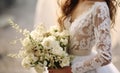 Captivating scene brides bouquet, dress, and intricate wedding elements weave enchanting memories