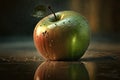 Still life with a green apple with water drops on a dark background Royalty Free Stock Photo