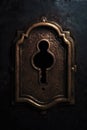 fancy old Victorian keyhole. Intricate details. Black background. Royalty Free Stock Photo