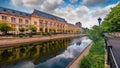 Captivating summer view of Court of Appeal Building on the shore of Dambovita river.