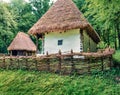 Captivating summer view of traditional romanian peasant houses. Nice rural scene of Transylvania, Romania, Europe. Beauty of