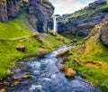 Captivating sunrise view of Kvernufoss watterfall. Superb summer scene of pure water river in Iceland, Europe. Beauty of nature co