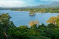 Serene Lake and Greenery under Blue Sky at Heritance Kandalama.