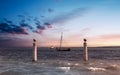 Captivating view of two ships sailing across the vast ocean, with large billowing clouds in the sky Royalty Free Stock Photo