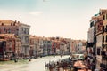 Captivating view of Venice\'s Grand Canal: beautifully colored buildings, boats, and gondolas