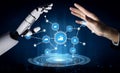 Modern Technology Interaction Between Human Hand and Robotic Arm with Data Icons Representing Artificial Intelligence Royalty Free Stock Photo