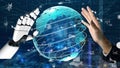 Futuristic Concept of Human-Machine Interaction with a Robotic Hand Reaching for a Digital Globe Representing Global Royalty Free Stock Photo