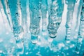 Captivating winter scene icicles hanging from roof with beautiful frozen water droplets Royalty Free Stock Photo