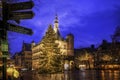 the old town hall at night is lit up with holiday decorations Royalty Free Stock Photo