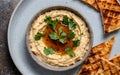 Capture the essence of Baba Ghanoush in a mouthwatering food photography shot