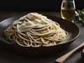 Capture the essence of Spaghetti Cacio E Pepe in a mouthwatering food photography shot