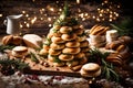 Capture the festive spirit with an appetizing display of bread buns arranged in the shape of a Christmas tree, accompanied by Royalty Free Stock Photo