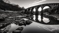 Travel Photography: Black And White Reflection Of Viandolfo\'s Ancient Stone Bridge At Sunset Royalty Free Stock Photo