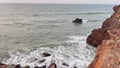 Ocean Waves in the beach hitting mountain at Thanthadi sea shore