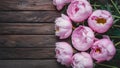 Capture Stunning pink peonies on rustic wooden background, copy space