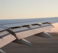 Aerodynamics in Action: Deploying Flaps at Sunset Royalty Free Stock Photo