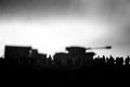 Captured by enemy concept. Military silhouettes and crowd on war fog sky background. World War Soldiers and armored vehicles