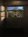 Sticker of a bike on a train window