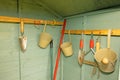 Hanging rail, inside the garden tool shed. Royalty Free Stock Photo