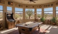 billiards table with pool cue and balls sits in sunlit room with large window offering desert Royalty Free Stock Photo