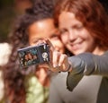 Capturing everlasting memories. a two young girls taking a self-portrait outdoors. Royalty Free Stock Photo