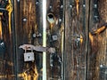 Capturing the nostalgia of an old wooden woor with an aged lock