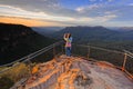 Capturing a photo of sunrise mountain lookout Royalty Free Stock Photo