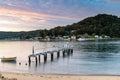 High Cloud Sunrise over the Bay, Boat and Old Wharf