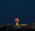 Capturing the Supermoon\'s Embrace in Seville\'s Skyline Royalty Free Stock Photo