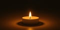 Capturing the Warmth and Elegance of a Single Tealight Candle A CloseUp Study of a Glowing Flame for Royalty Free Stock Photo