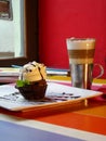Capuccino with ice muffin Royalty Free Stock Photo