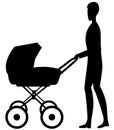 Dad with a baby in a stroller Royalty Free Stock Photo
