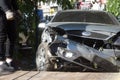 Car accident, head-on collision. Tow truck loads a wrecked car after an accident Royalty Free Stock Photo