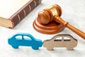 Car accident. Judge gavel and two cars collided. Car Insurance Solution