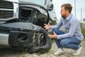 Car accident. Man after car accident. Man regrets damage caused during car wreck