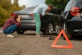 Car accident on road, male and female drivers Royalty Free Stock Photo