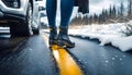 Car accident in winter, Woman waiting for help on the road after an accident on a snowy slippery road, following traffic rules, Royalty Free Stock Photo