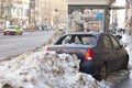 Abandoned car covered with snow after a car accident Royalty Free Stock Photo