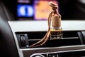 Car air freshener, close-up on the dashboard with blurred background Royalty Free Stock Photo