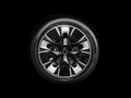 Car alloy wheel and tyre isolated on black background. New alloy wheel with tire. Alloy rim isolated. Car wheel disc. Car spare Royalty Free Stock Photo