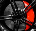 Car alloy wheel and tyre texture background. New alloy wheel with tire and red carbon ceramic brakes. Alloy rim isolated. Car