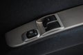 Car arm rest with Control Panel. Door Lock & Mirror Control. window adjustment buttons, door lock. Photography of a modern car. Royalty Free Stock Photo